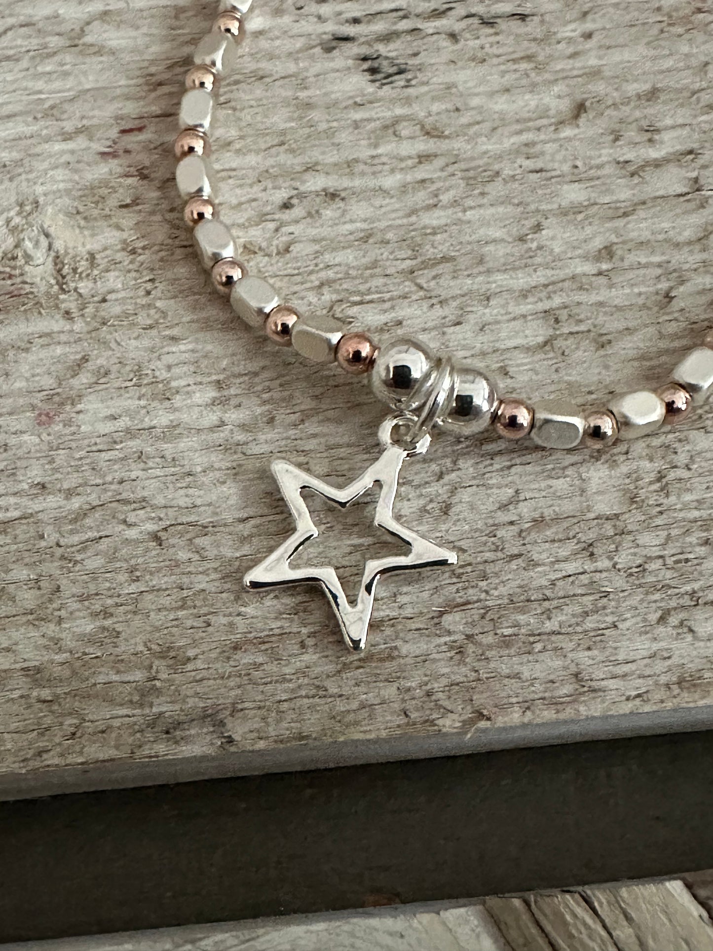 Two Tone Star Charm Elasticated Bracelet