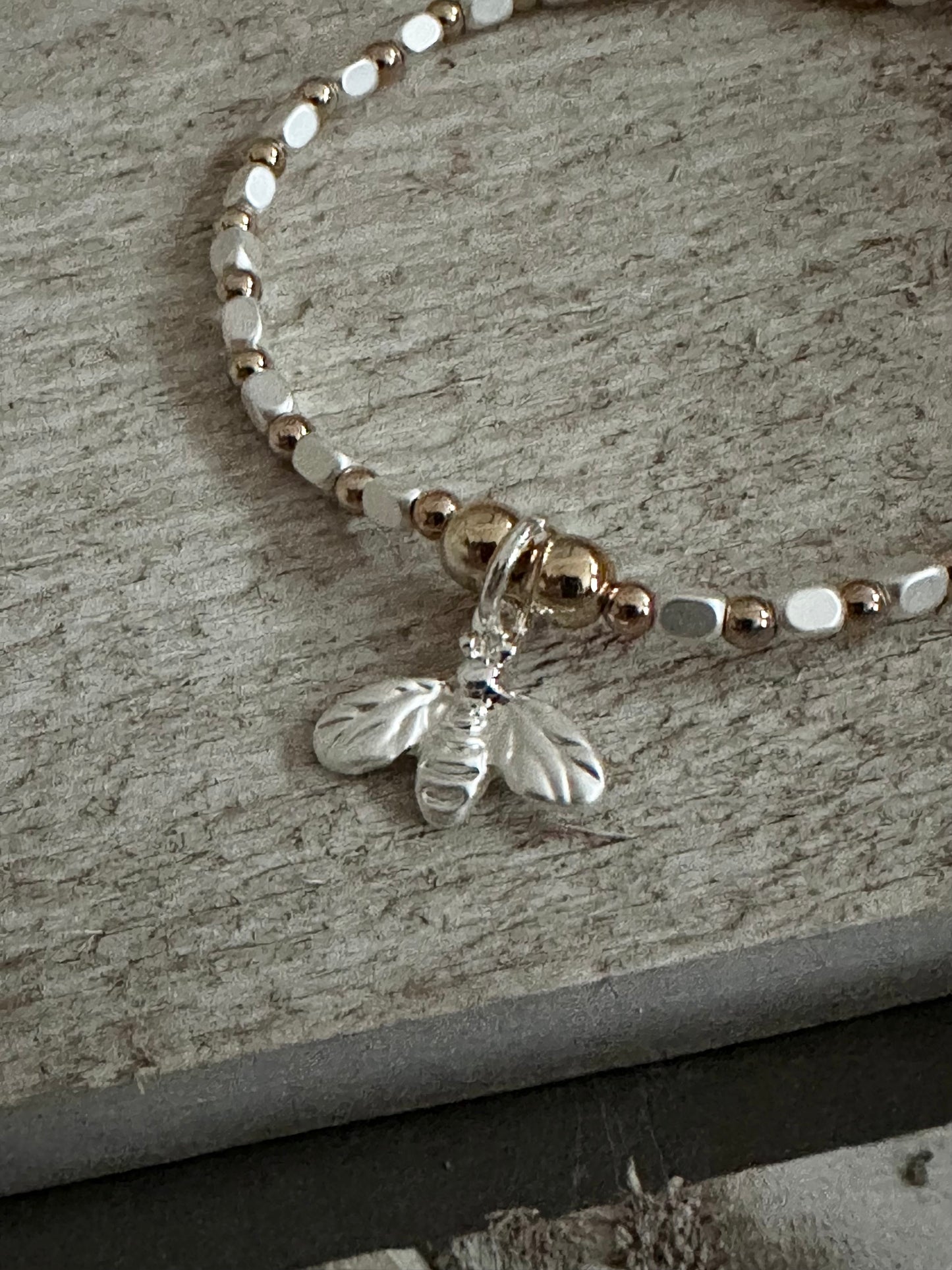 Bee Charm Two Tone Elasticated Bracelet