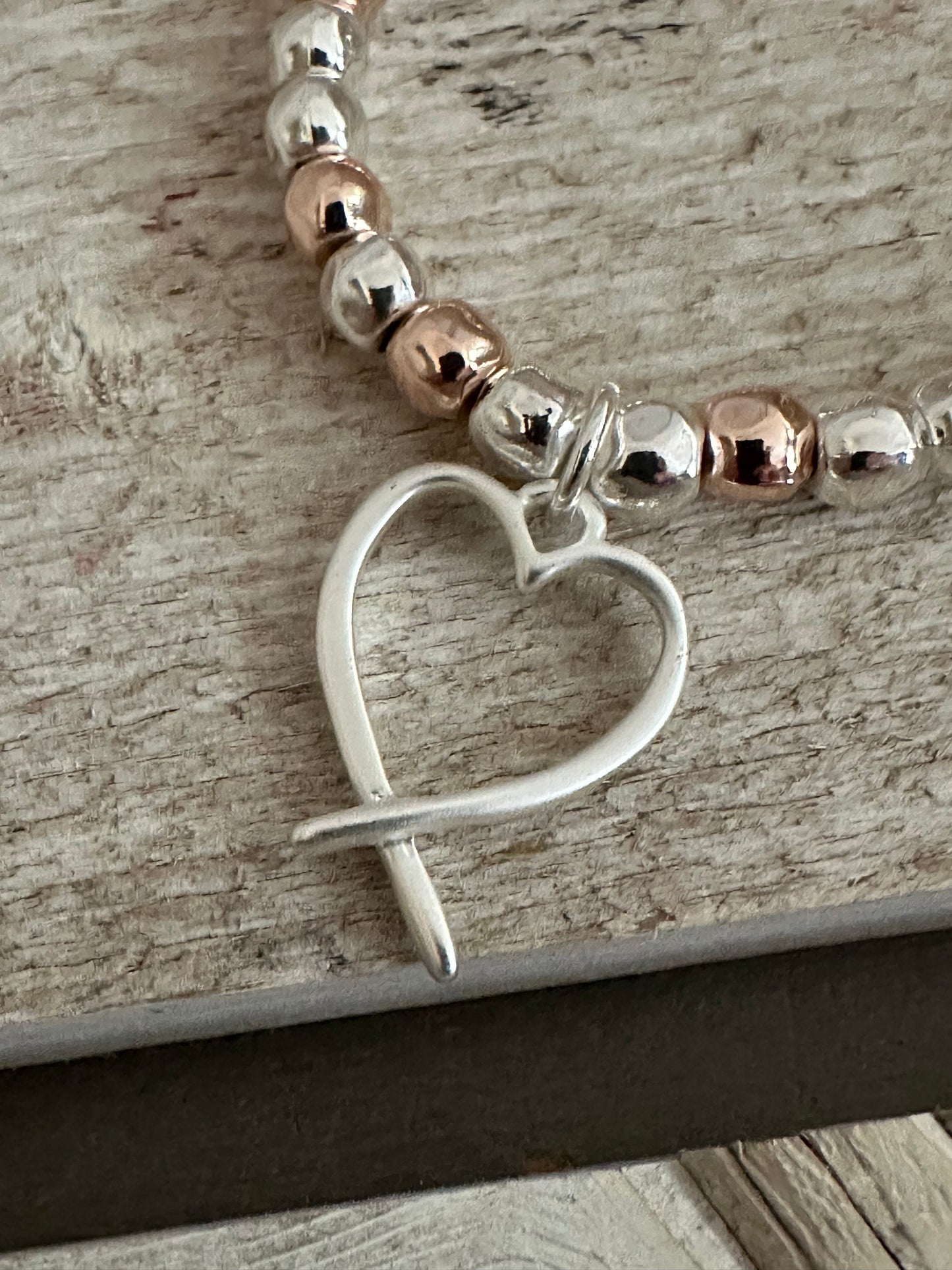 Two Tone Heart Charm Elasticated Bracelet